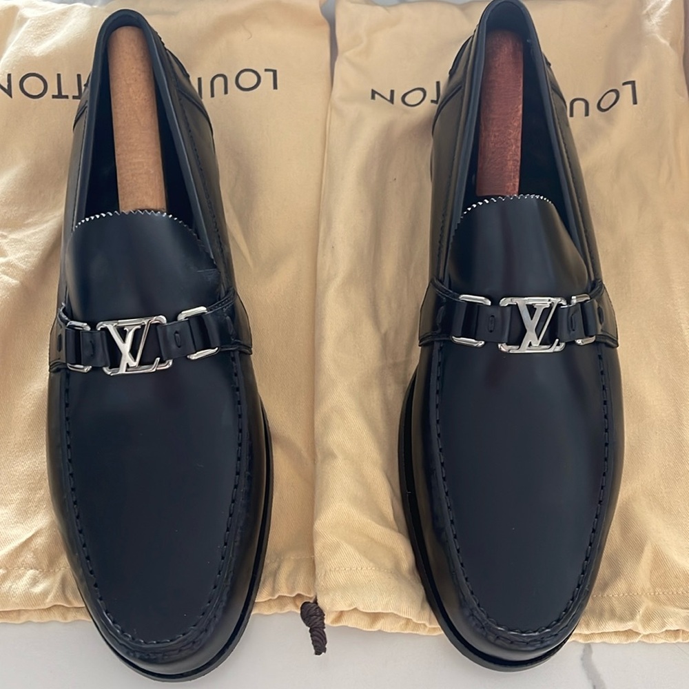 Louis Vuitton loafers worn once. Size 11 silver buckle.
